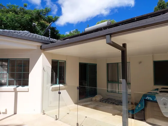 New continuous guttering and downpipe on a rendered Northern Rivers home