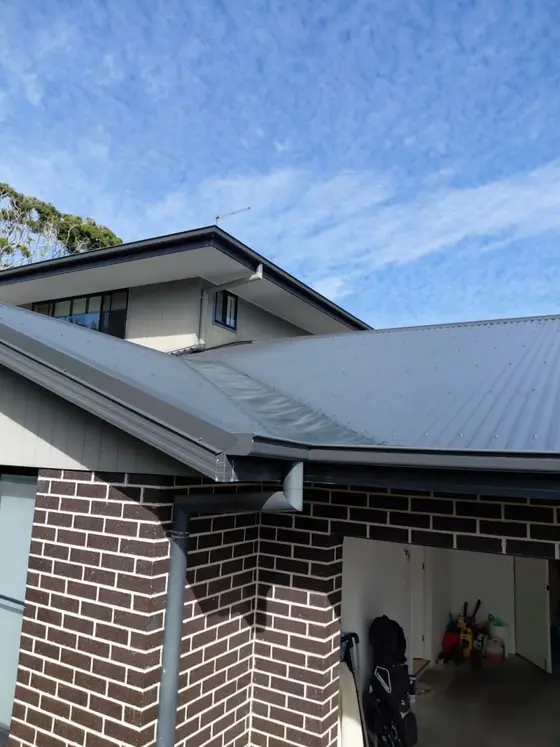Fresh metal roof and guttering after a tile to tin conversion