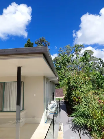 New guttering on a two-storey rendered home